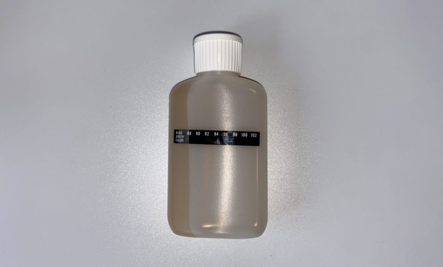 urine bottle with the temperature strip attached